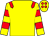 Yellow, red epaulettes, hooped sleeves, yellow cap, red spots