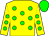 Yellow body, green spots, yellow arms, green spots, green cap