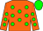 Orange body, green spots, orange arms, green spots, green cap