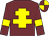 Garnet body, yellow cross of lorraine, garnet arms, yellow armlets, garnet cap, yellow quartered