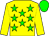 Yellow body, big-green stars, yellow arms, big-green cap