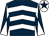 Dark blue & white chevrons, white sleeves, dark blue diabolo, white cap, dark blue star