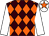 Brown and orange diamonds, white sleeves, white cap, orange star