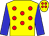 Yellow body, red spots, blue arms, yellow cap, red spots