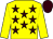 Yellow body, brown stars, yellow arms, brown cap