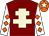 Maroon, beige cross of lorraine, white sleeves, orange diamonds, orange cap, beige star