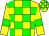 Yellow body, green checked, yellow arms, green armlets, yellow cap, green checked