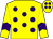 Yellow body, purple spots, yellow arms, purple chevron, yellow cap, purple spots