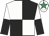 Black & white quartered, halved sleeves, white cap, emerald green star