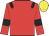 Red body, black epaulettes, red arms, black armlets, yellow cap