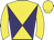 Yellow body, purple diabolo, yellow arms, yellow cap