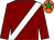 Maroon, white sash, orange cap, emerald green star