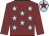 Maroon, light blue stars, maroon sleeves, light blue cap, maroon star