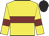 Yellow, maroon hoop and armlets, black cap
