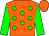 Orange body, green spots, green arms, orange cap