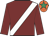 Maroon, white sash, orange cap, emerald green star
