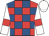 Red and royal blue check, white sleeves, red armlets, white cap