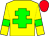 Yellow body, big-green cross of lorraine, yellow arms, big-green armlets, red cap