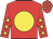 Red body, yellow disc, red arms, yellow stars, red cap, yellow stars