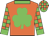 Orange, green shamrock, checked sleeves, green collar and cuffs, checked cap, green peak