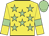 Yellow body, light green stars, yellow arms, light green armlets, light green cap