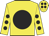 Yellow body, black disc, yellow arms, black spots, yellow cap, black spots