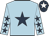 Light blue, dark blue star, dark blue stars on sleeves, dark blue cap, white star
